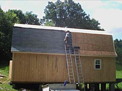 Michael putting on the shingles