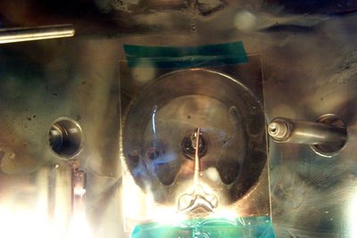 Gasp - tape in vacuum system!  Not so bad, it's 600f rated stuff and won't get hot in this use anyway.