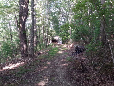 Storage shed.  That can be filled too, but it's hard to get to with the tractor when there's snow on the ground.  And uphill to everywhere you'd want this wood - this is emergency stuff.