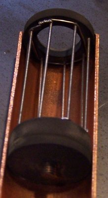 Old (but record-setting) grid design.  Graphite ends, Ta wire to pull the rods together so it doesn't fly apart under the E field forces.