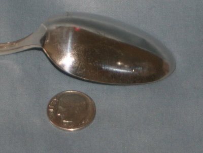 After final polish - it's not perfect, but hey, it's "used".  The 90% Ag dime is a size reference