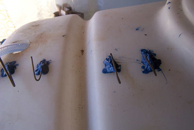 Drive wire at left - goes to the bottom and along the length of the tank at bottom level.  The other three are the intermediate level probes, shortest first.