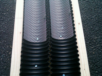 Expanded metal leaf guard in place