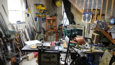 Can't even use the table saw...everything horizontal becomes an archaeological dig.