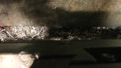 Bolt on the back, sticking down in pic.
