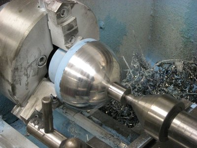 The finished hemisphere still on the mandrel.
