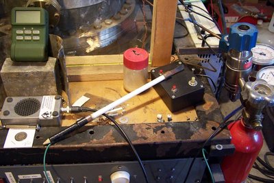 Screwdriver for HV, made of fiberglass.  Note ground between me and the business end...tested to 40kv, probably good for more.