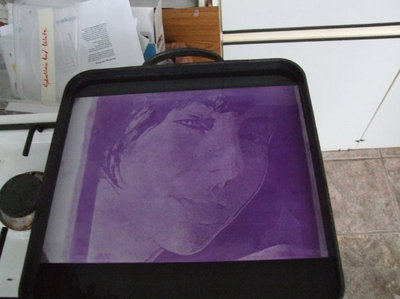 The aluminium sheet is placed into a tray of dye for 15 minutes. Wherever the metal was exposed to the sulphuric acid, it has become porous and so is more receptive to the dye.<br />The sheet is then boiled in distilled water for 30 minutes to seal the dye. It is then left to dry, cut to size and sprayed down with compressed air and laquer.